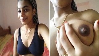 Intimate video of a stunning girl revealing her breasts to her partner