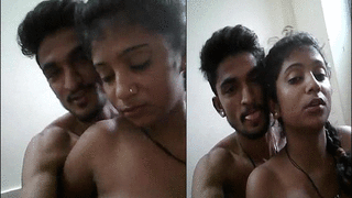 Homemade video of Indian couple kissing and touching in the kitchen