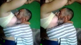 Arab mature man receives boob milk from chubby woman