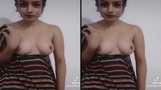 Beautiful Indian woman flaunts her breasts