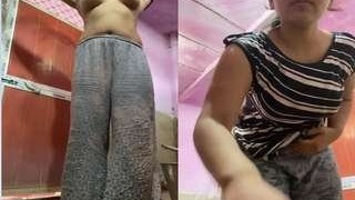 Busty Indian girl strips and teases for cash