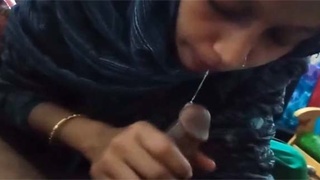 Muslim wife gives a blowjob to her husband in front of the camera