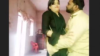 Stunning bhabhi with a black partner in a steamy video