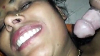 Seductive wife gives a blowjob to her friend