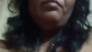 Desi mom strips down and indulges in solo masturbation on camera