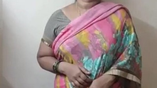 Aunty Padma teases in a saree before stripping