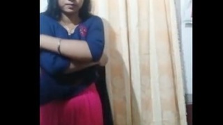 Desi teen flaunts her body in a sexy dress and opens it up