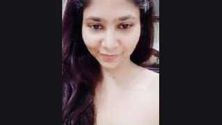 A cute Indian girl flaunts her body in a steamy video