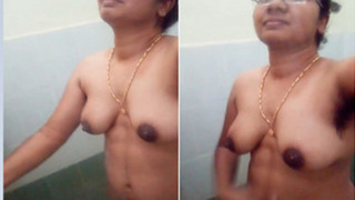Indian desi aunty with glasses flaunts her hairy armpits in the shower