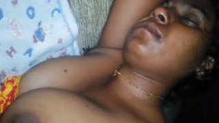 Husband touches sleeping wife's breasts while she's naked