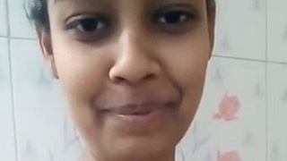 Indian woman unhooks bra for solo selfies