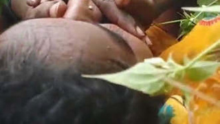Desi couple enjoys steamy sex behind the door