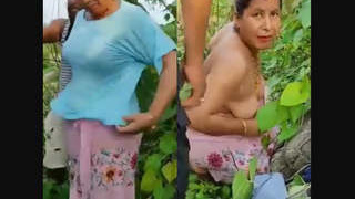 Desi auntie gets wild in the jungle with her lover