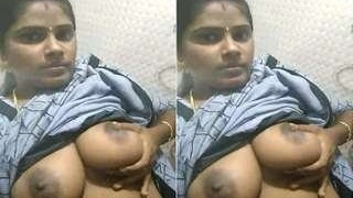 Excited Indian bhabhi strips and masturbates in front of camera