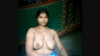 Indian village woman reveals her naked body