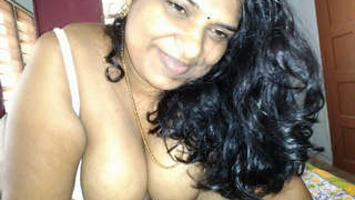 Tamil auntie in hot lingerie gives a blowjob