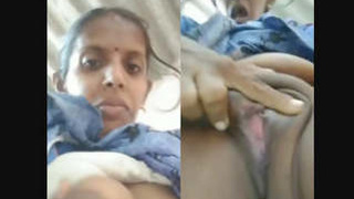 Tamil auntie flaunts her breasts and pussy in a steamy video