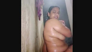 Desi bhabi gets naughty in a bathroom webcam session