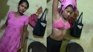 Desi Indian girl swaps outfits in online video