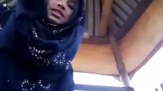 Cute teen in hijab shows off her sexy pussy in solo video