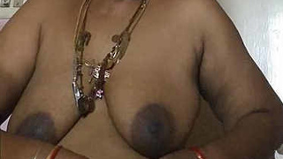 Aged Tamil aunty's big boobs in action