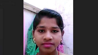 Horny village girl exposes her big tits and pussy