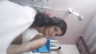 A young and beautiful girl from Chennai films herself taking a shower