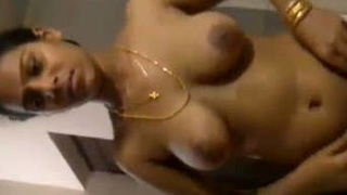 Mallu aunt strips down and performs a steamy oral sex act on her partner