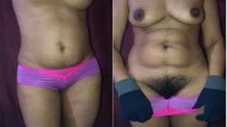 Indian girl teases with gloves and lingerie, revealing her naughty body parts