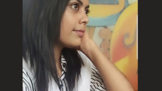 Desi's cute collage outfit in a steamy video