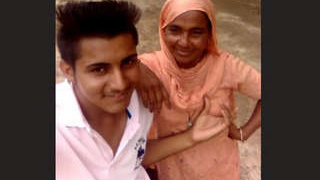 Bhabhi's big breasts push against dewar in hot video