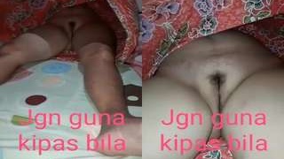 Watch a secretly recorded video of a sleeping wife's pussy