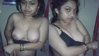 Indian bhabhi flaunts her big boobs in black lingerie