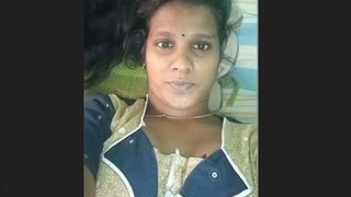 Tamil girl flaunts her breasts and pussy in a steamy video