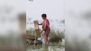 Auntie in a sheer blouse gets naughty in the kitchen