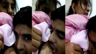 Indian couple indulges in tit play on camera
