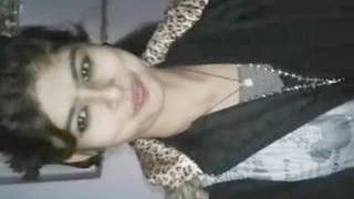 A cute brunette Desi girl gets her tight pussy fucked in a video