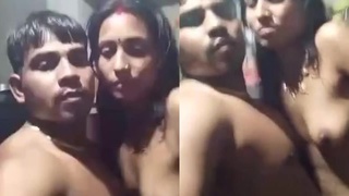 Naked couple enjoys standing sex position