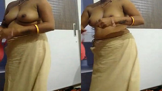 Amateur Indian Bhabhi in Clothes: Exclusive Video