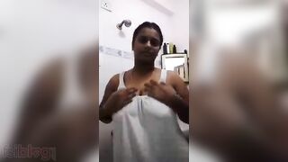 Busty Indian wife Mallu Desi gives a boob show and masturbates