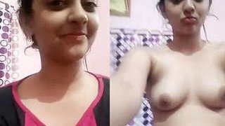Sopna's adorable boobs on cam: A solo performance