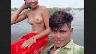 Desi couple enjoys outdoor bath time in village