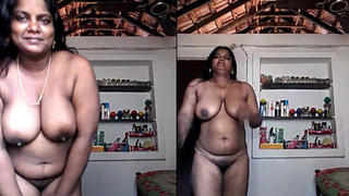 Tamil wife flaunts her large breasts and intimate area