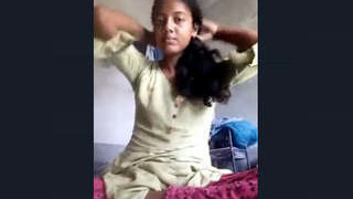 A cute Indian girl flaunts her breasts in a video