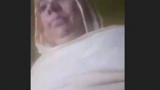 Mature Pakistani woman performs in front of camera