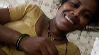 Indian wife gives a blowjob and gets ready for sex