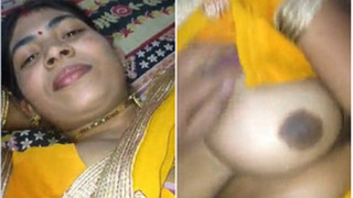 Indian girl's big boobs get touched after winning a contest