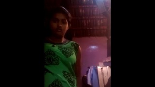 A sweet Tamil girl flaunts her breasts in a steamy video