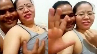 Nepali aunty takes a video of herself while her husband massages her breasts with clear audio