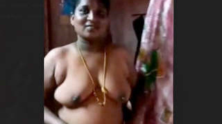 Tamil woman's nude body on display